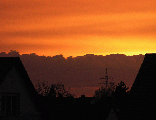 2006-04-fc-Sonnen-Untergang mit Wolkenfront