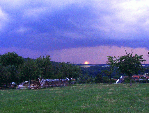 2008-07-f-Sonnen-Effekt durch Gewitter-Regenfront  - Odenwald