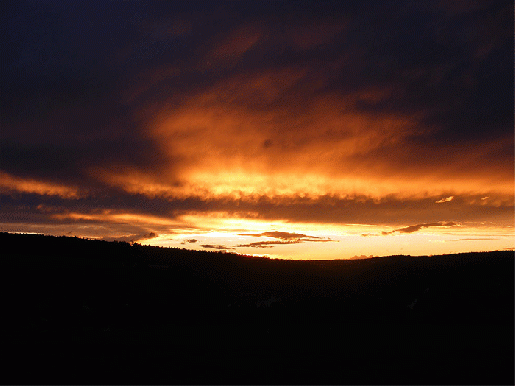 2008-08-fuec-Sonnenuntergang mit Wolkenschatten-Effekt
