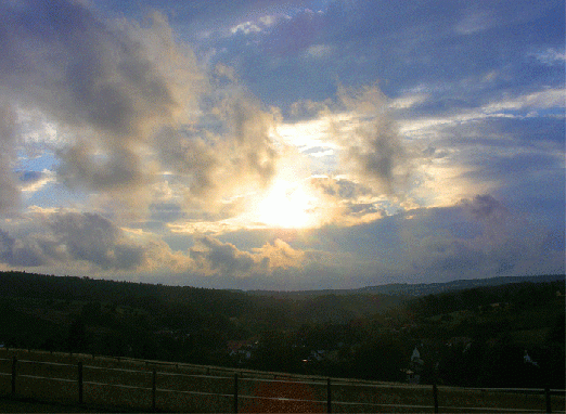 2009-06-esa-Sonnenuntergang mit Wolkenspiel - Odenwald
