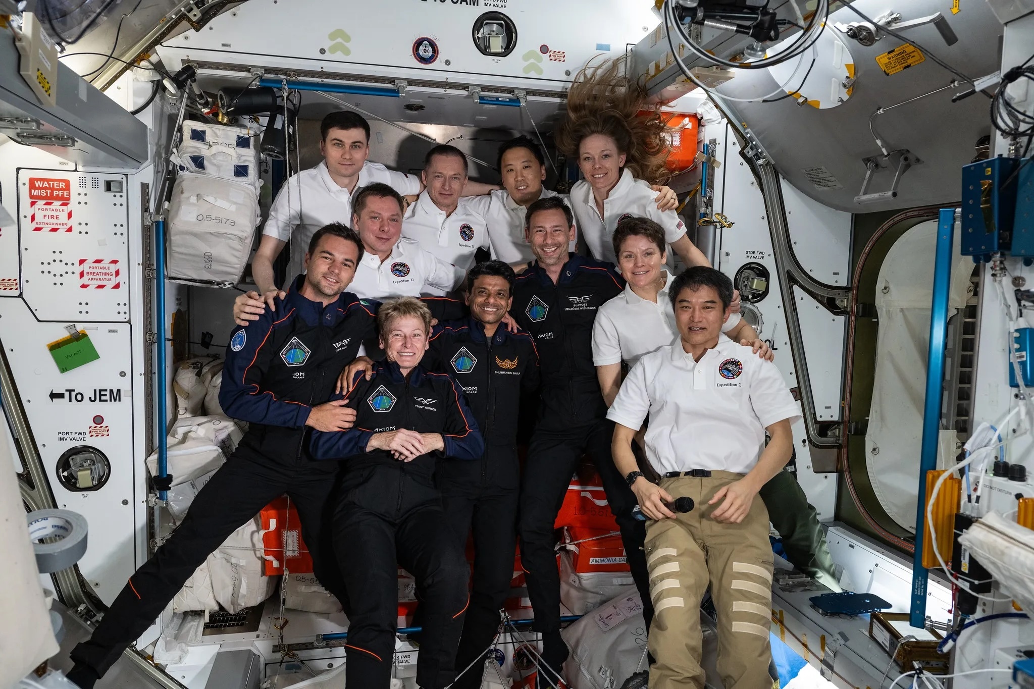 the-axiom-mission-4-and-expedition-73-crews-take-a-group-portrait